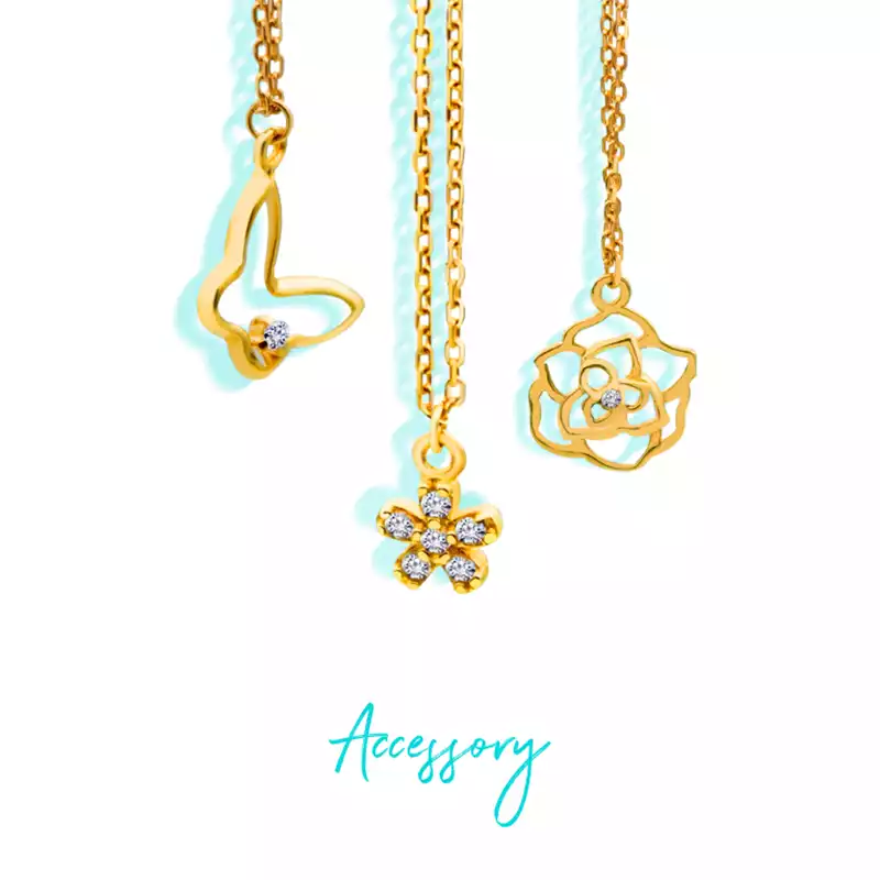 Three gold watch pendants with butterfly, jeweled flower, and hollow flower designs