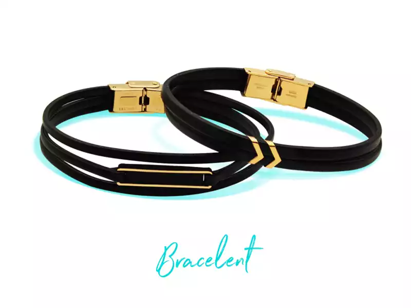 Two black leather bracelets with gold details and a sturdy clasp, stylish and minimalist design
